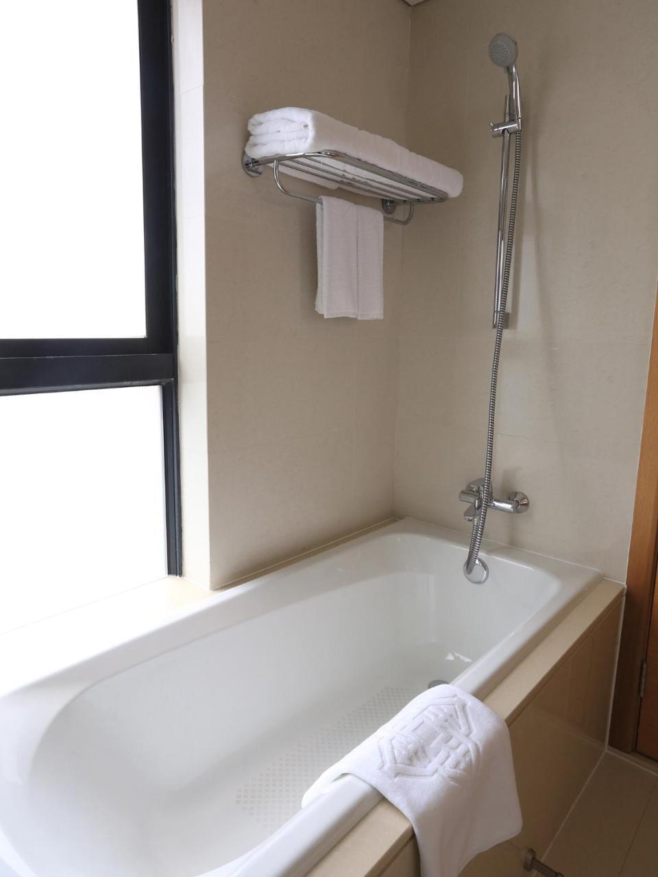 Wuxi Koschenny Graceland Service Residence Exterior foto